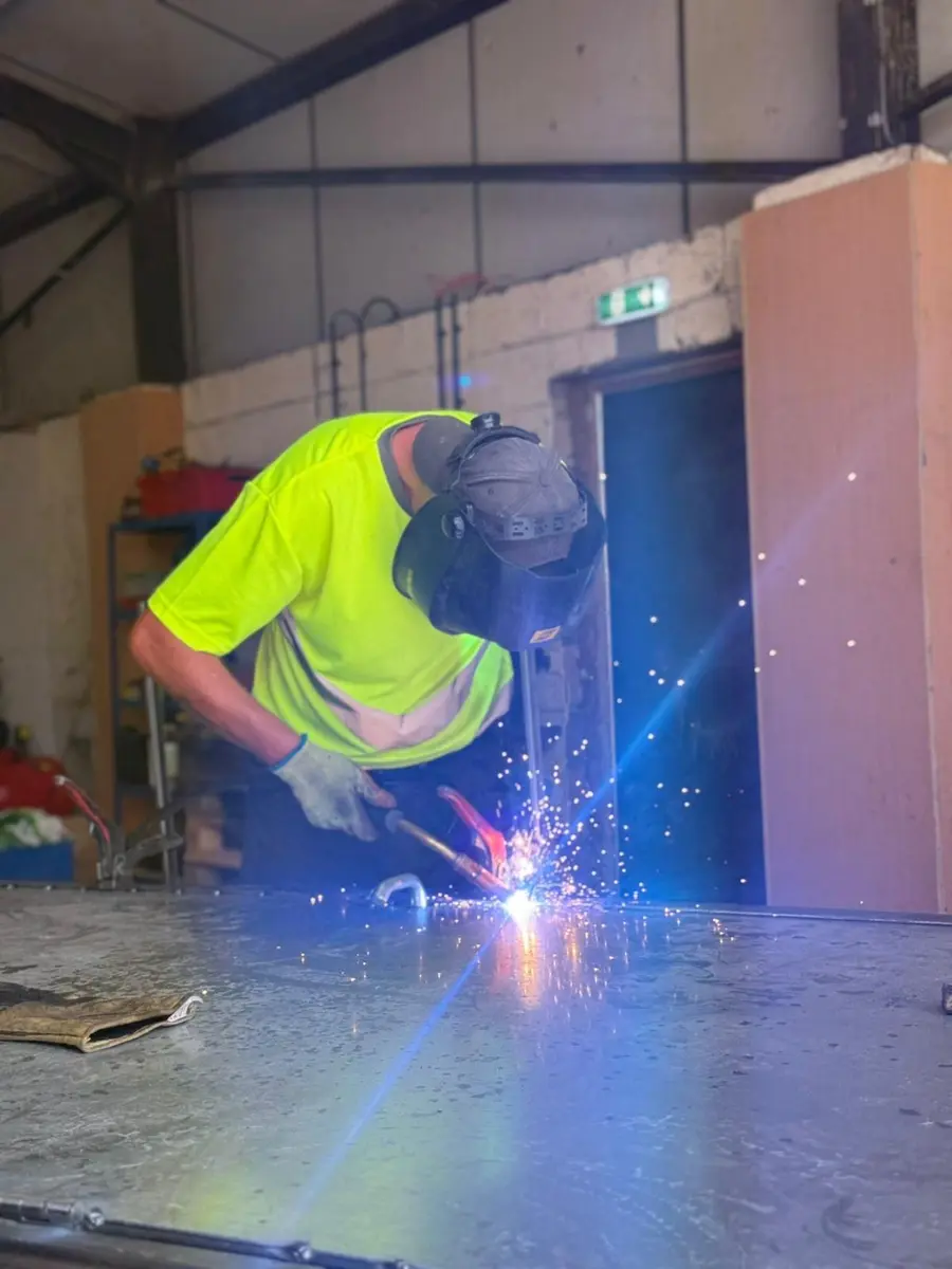 Cerberus fabricator welding in the Doncaster workshop