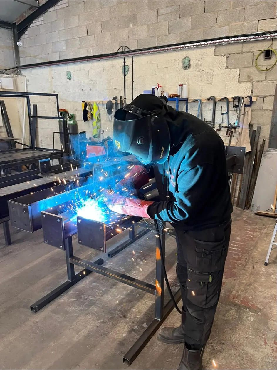 Cerberus fabricator welding in the workshop